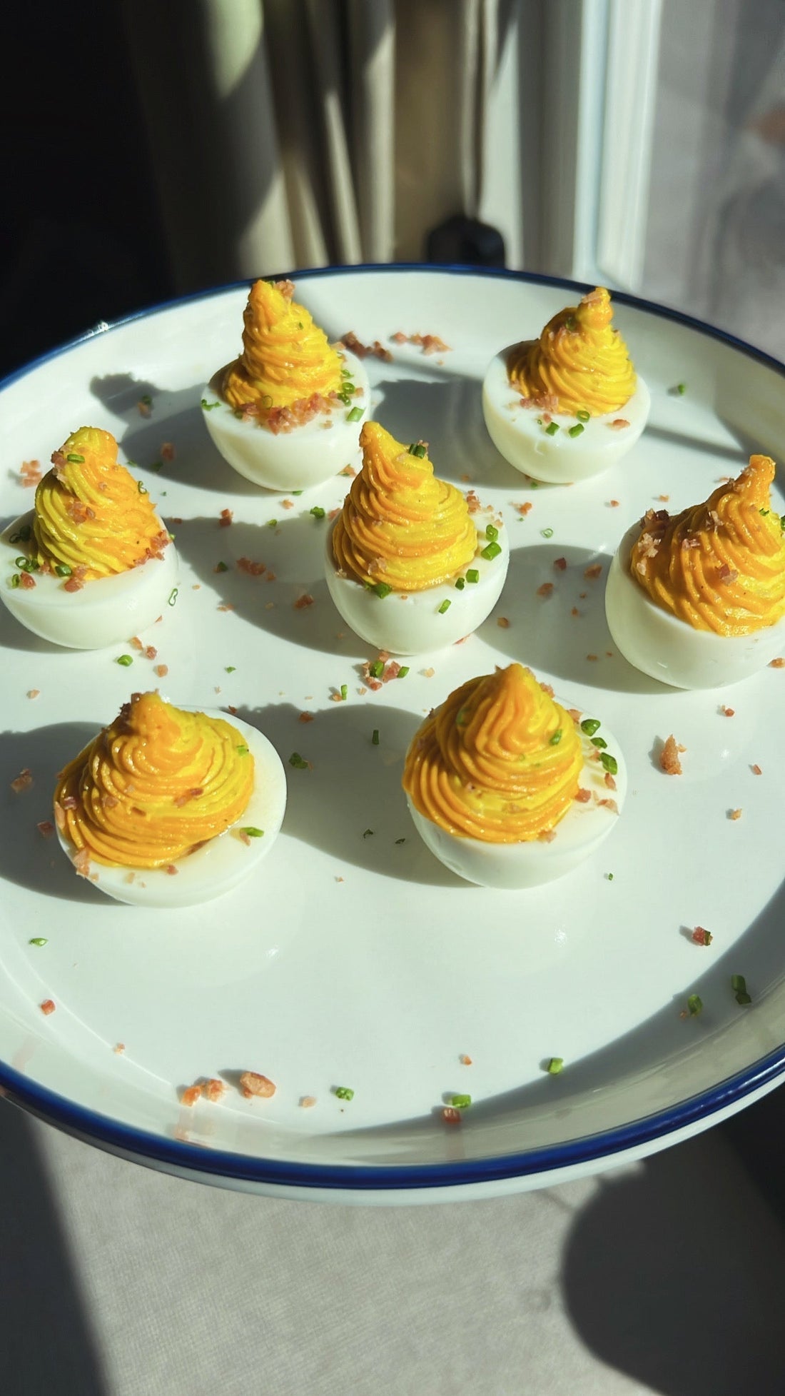 TWO-TONE CURRIED DEVILED EGGS w. SAVORY BACON ONION JAM