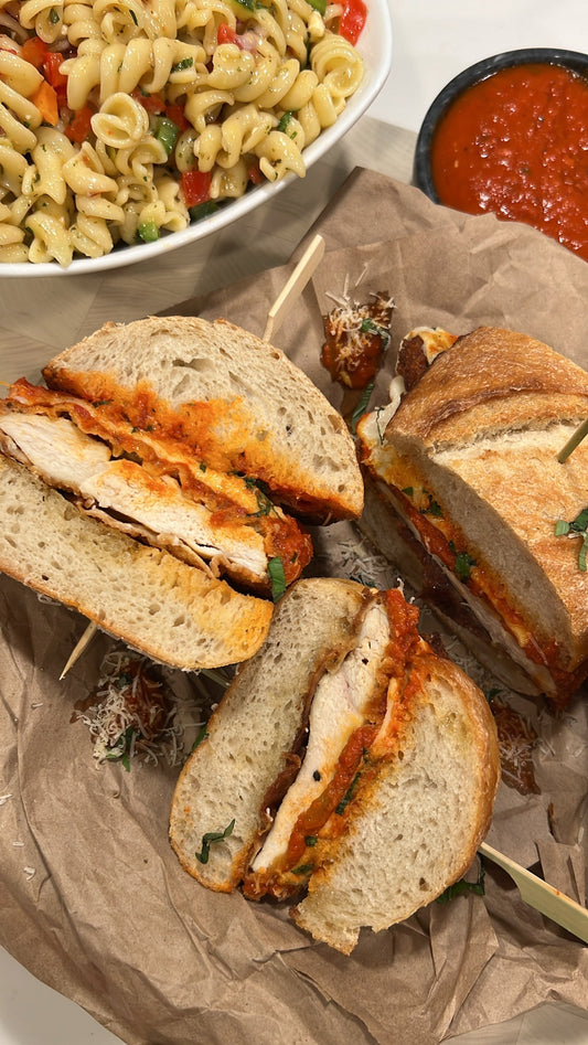 Crispy Chicken Parmesan Sandwiches served with Rao’s Homemade® Fusilli Pasta Salad